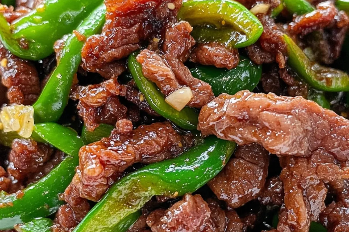 Tender sliced beef stir-fried with fresh green chilies, delivering a savory kick with a hint of heat at Dim Sum Taste，a Chinese Restaurant in West Chester